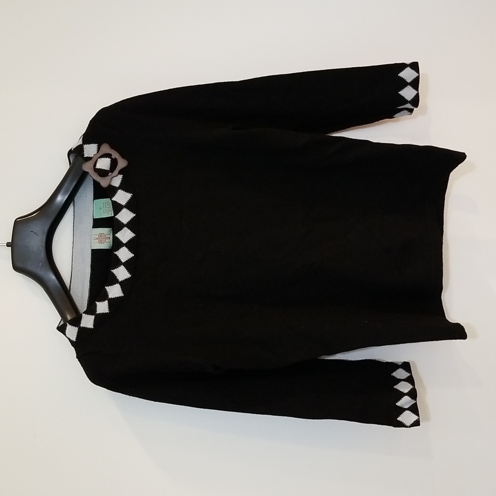 Anthropologie black sweater with blue diamond neck and sleeve detail size S